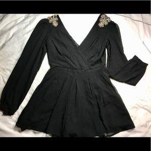 Elegant Black Surplice Romper